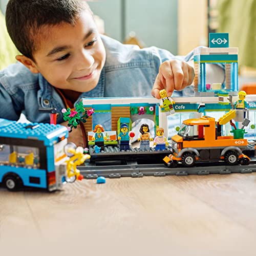 LEGO City Train Station Set with Toy Bus for Kids, Rail Truck, Tracks and Road Plate Level Crossing, Compatible with City Sets